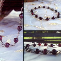 1-bracelet, small deep red round stones , chain links